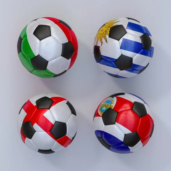 Balles de football avec drapeaux de l'Uruguay, Costa Rica, Angleterre, Italie — Photo