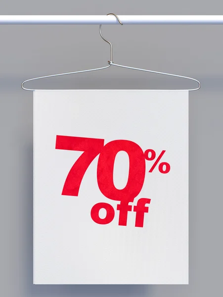 Wire hanger with sale sign — Stock Photo, Image