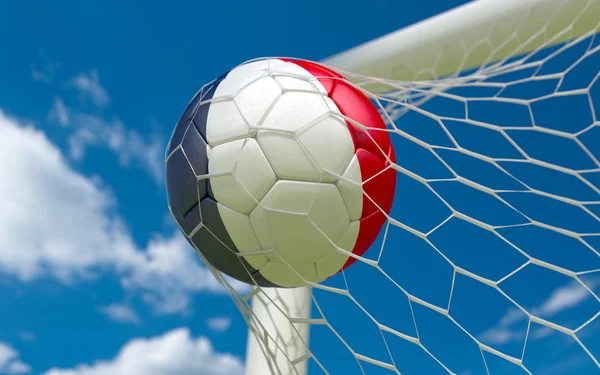 France flag and soccer ball in goal net — Stock Photo, Image