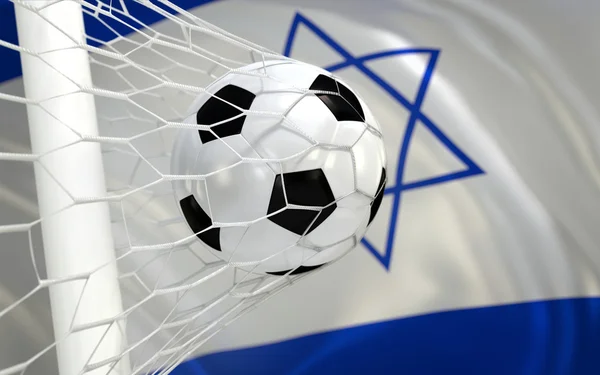 Drapeau d'Israël et ballon de football dans le filet de but — Photo