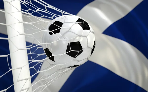 Bandera de Escocia y pelota de fútbol en la red de goles — Foto de Stock