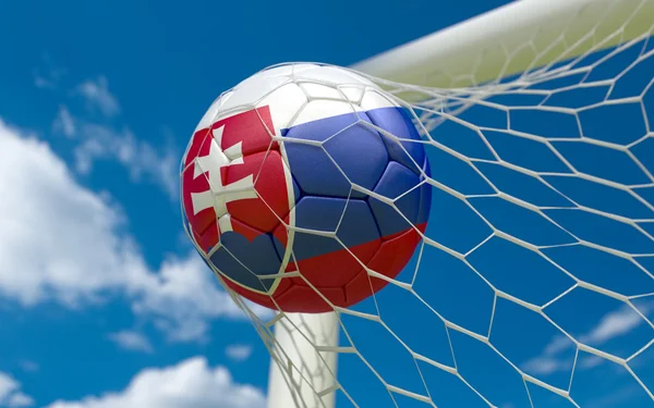 Flag of Slovakia and soccer ball in goal net — Stock Photo, Image