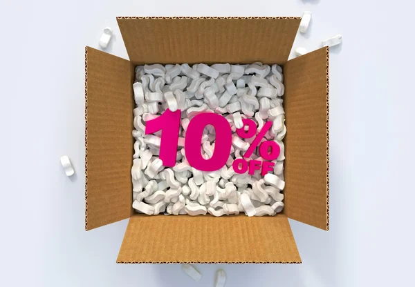 Box with shipping peanuts and 10 percent off sign — Stock Photo, Image