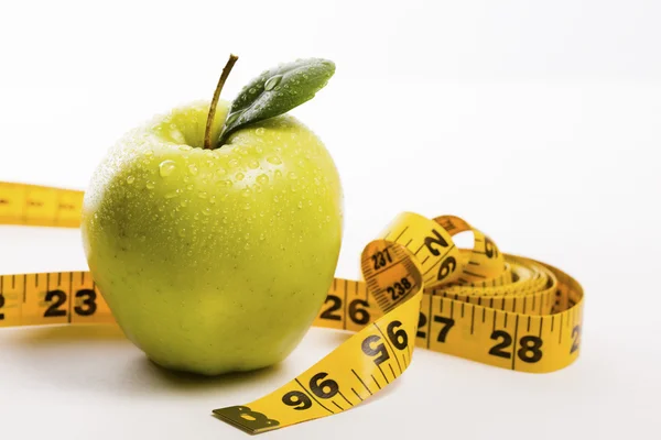 Juicy Green Apple and a Tape Measure — Stock Photo, Image