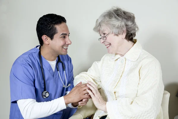 Nurse Assisting an Elderly Patient — Stock Photo, Image