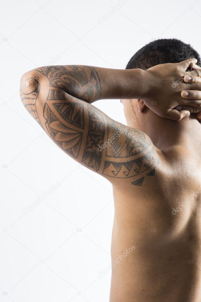 Shirtless Man with Tattoos