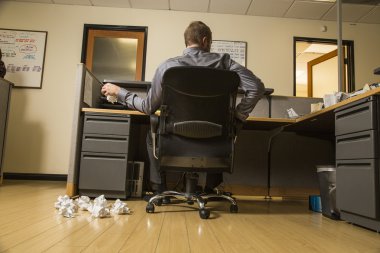 Frustrated man at work clipart