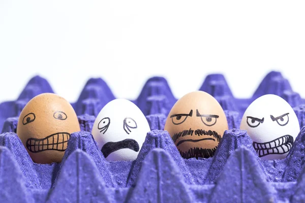 Eggs with faces — Stock Photo, Image