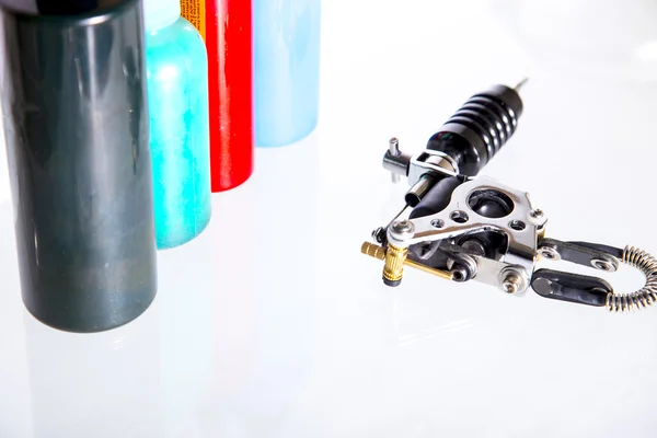 Tattoo gun and ink tubes — Stock Photo, Image