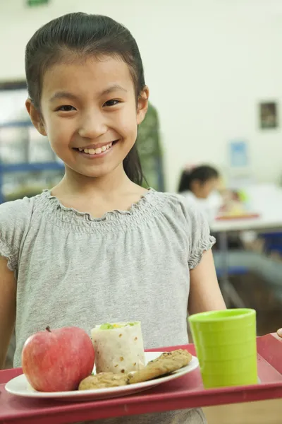 Skolepige i skole cafeteria - Stock-foto