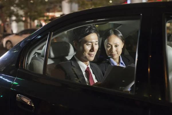 Business People Working In Car Back — Stock Photo, Image