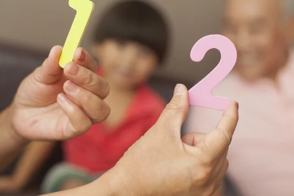 Grandson playing with grandparents — Stock Photo, Image