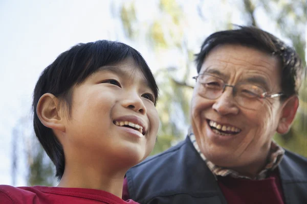 Grandfather and grandson fishing portrait at lake — Stock Photo, Image