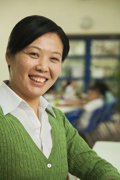 Teacher at lunch in school cafeteria — Stock Photo, Image