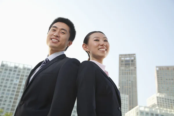 Two young business people — Stock Photo, Image