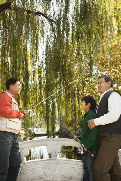 Multi-generational men fishing portrait — Stock Photo, Image
