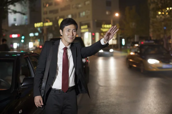 Businessman Hailing Taxi Cab — Stock Photo, Image