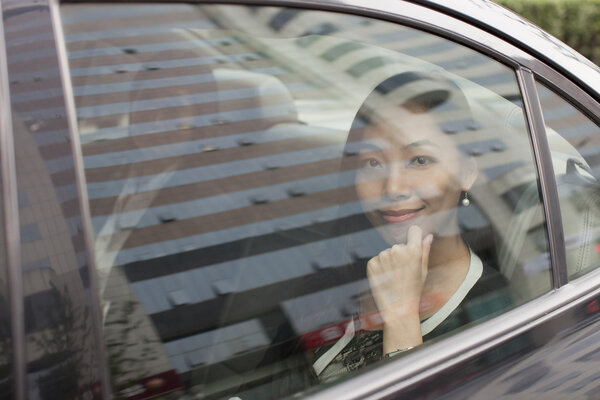 Businesswoman in Car Back