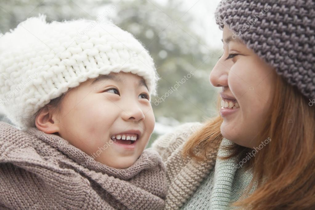 Mother and daughter in winter
