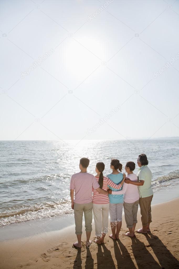 Family by the beach