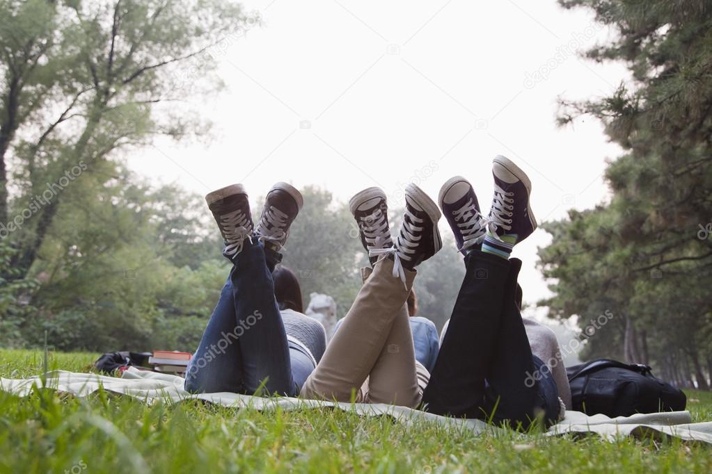 Teenagers hanging out in the park