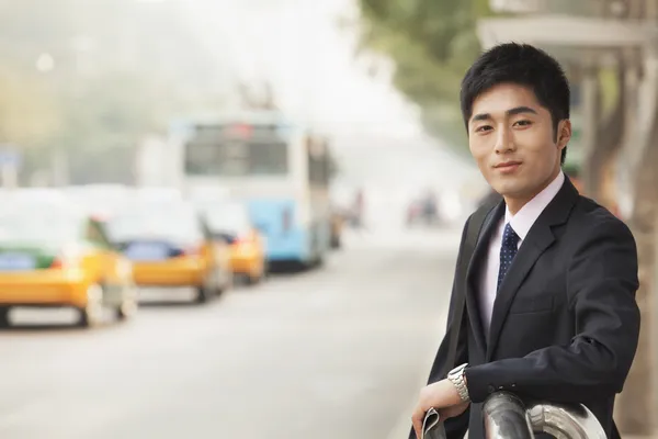 Businessman waiting at the bus — Stock Photo, Image