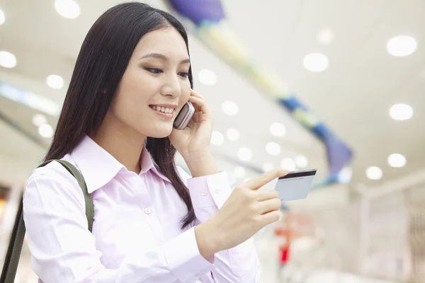 Businesswoman Checking the Ticket — Stock Photo, Image