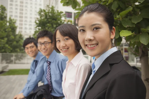 Business people smiling — Stock Photo, Image