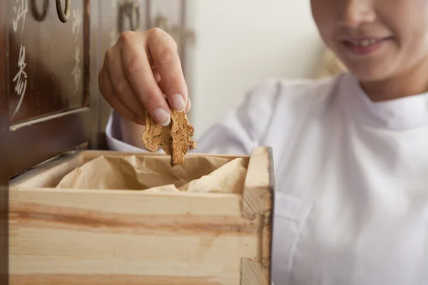 Doctor Taking Herb — Stock Photo, Image