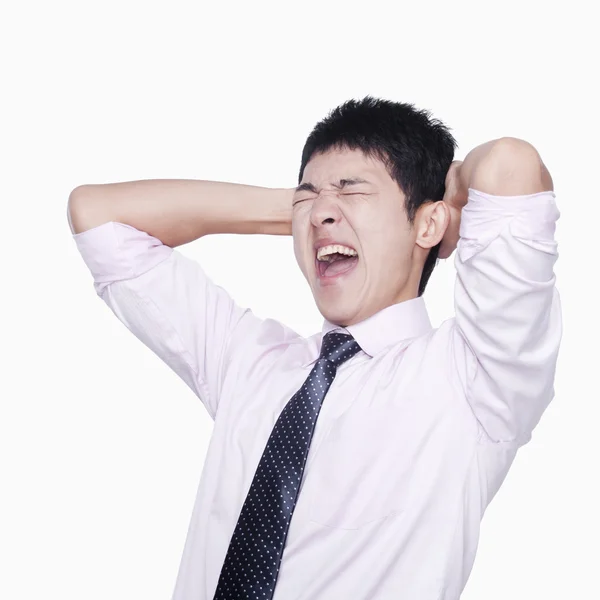 Frustrated businessman holding his head — Stock Photo, Image