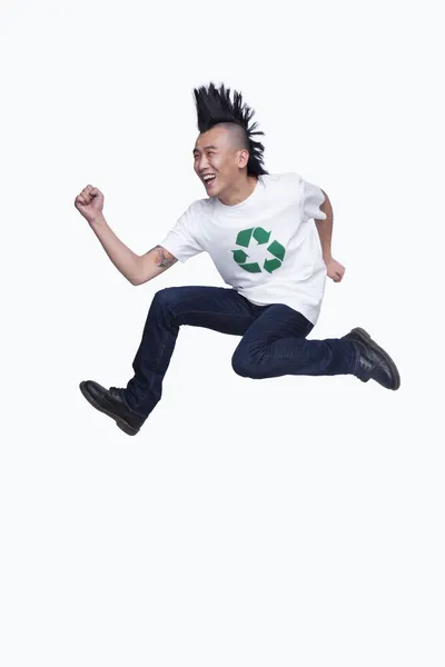 Man with Mohawk jumping — Stock Photo, Image