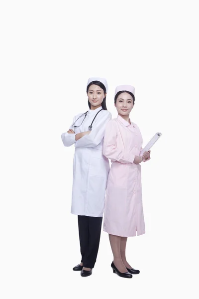 Two young nurses — Stock Photo, Image