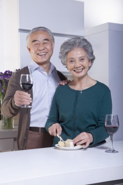 Senior Couple Drinking Wine clipart