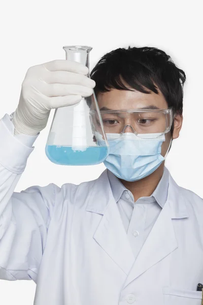 Scientist Looking at Beaker — Stock Photo, Image