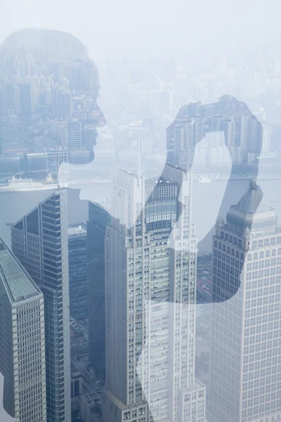 Double exposure of woman taking picture over cityscape — Stock Photo, Image