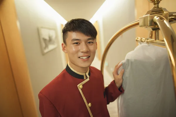 Bellhop smiling — Stock Photo, Image