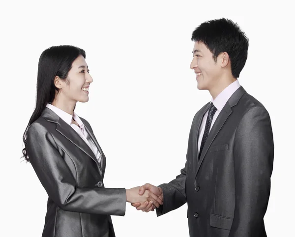 Coworkers handshaking — Stock Photo, Image