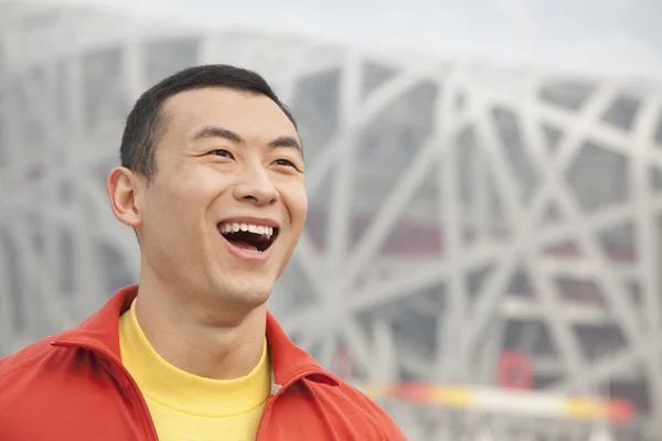 Laughing young man in park — Stock Photo, Image