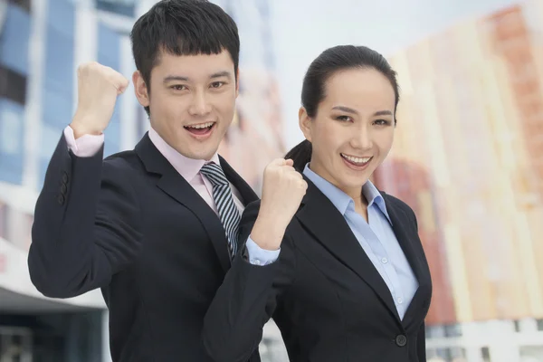 Business man and woman cheering — Stock Photo, Image