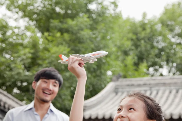 Girl Playing with Airplane — Stock Photo, Image