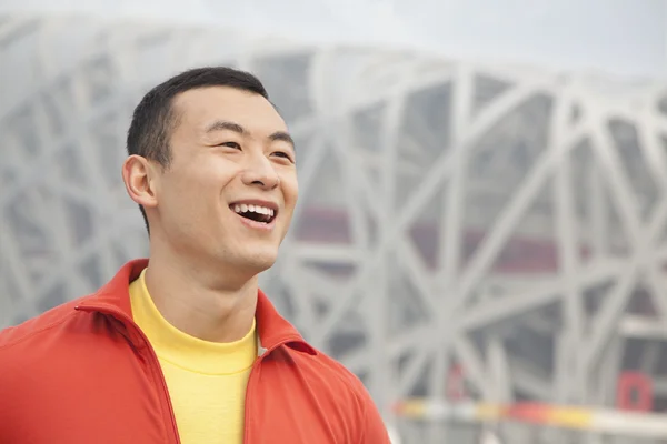 Smiling young man in park — Stock Photo, Image