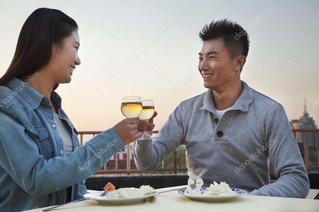 Couple eating on the roof top