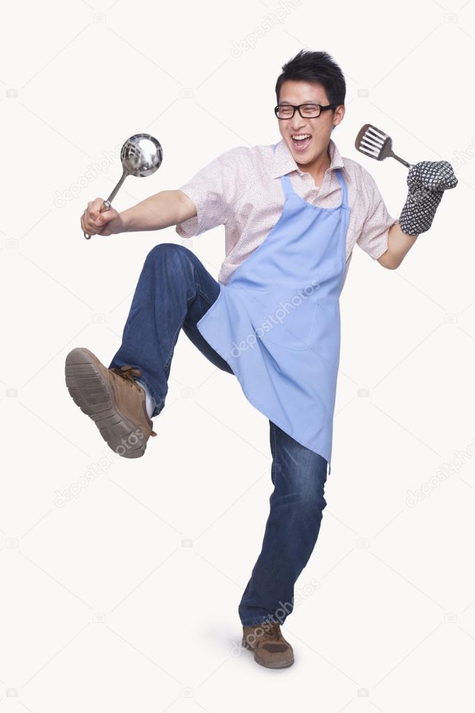 Man Playing with Cooking