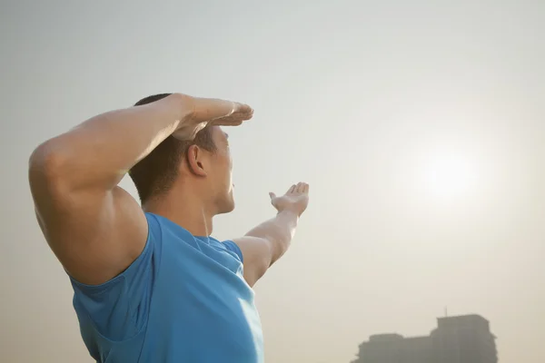 Muscular Man Stretching — Stock Photo, Image