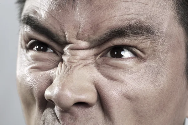 Extreme Close up on angry mans face — Stock Photo, Image