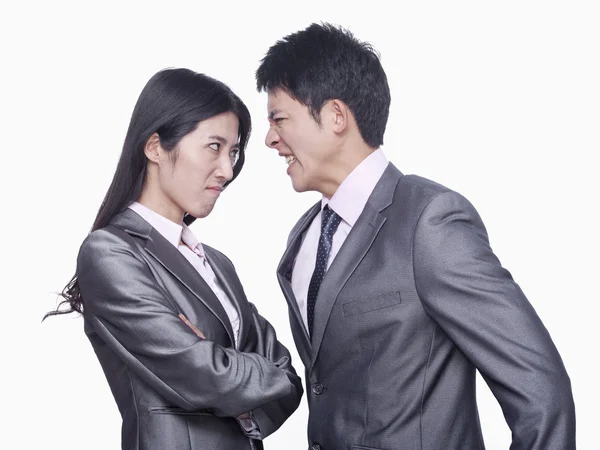 Businessman and businesswoman angry at each other — Stock Photo, Image