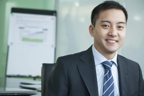 Businessman in meeting room portrait — Stock Photo, Image