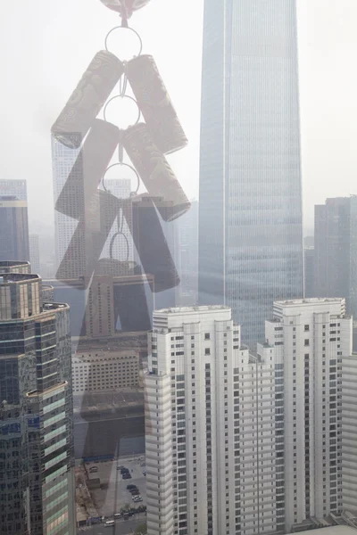 Chinese ornament over cityscape — Stock Photo, Image