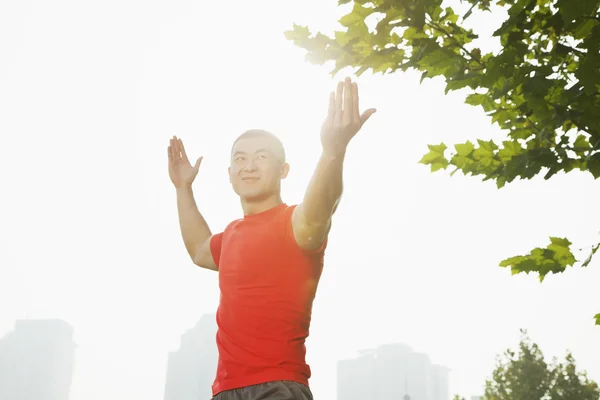 Muscular Man Stretching — Stock Photo, Image