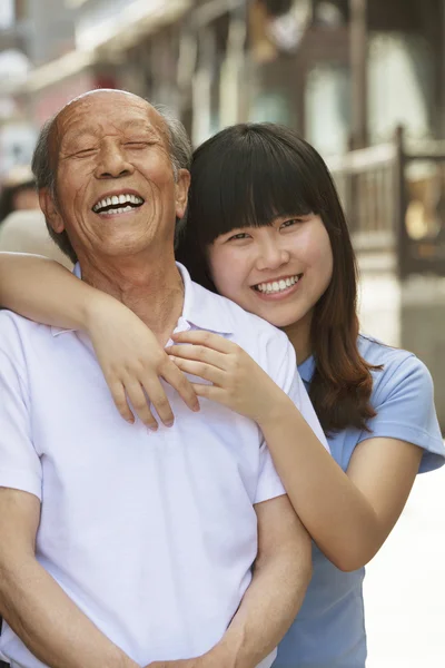 Grandfather and granddaughter together — Stock Photo, Image